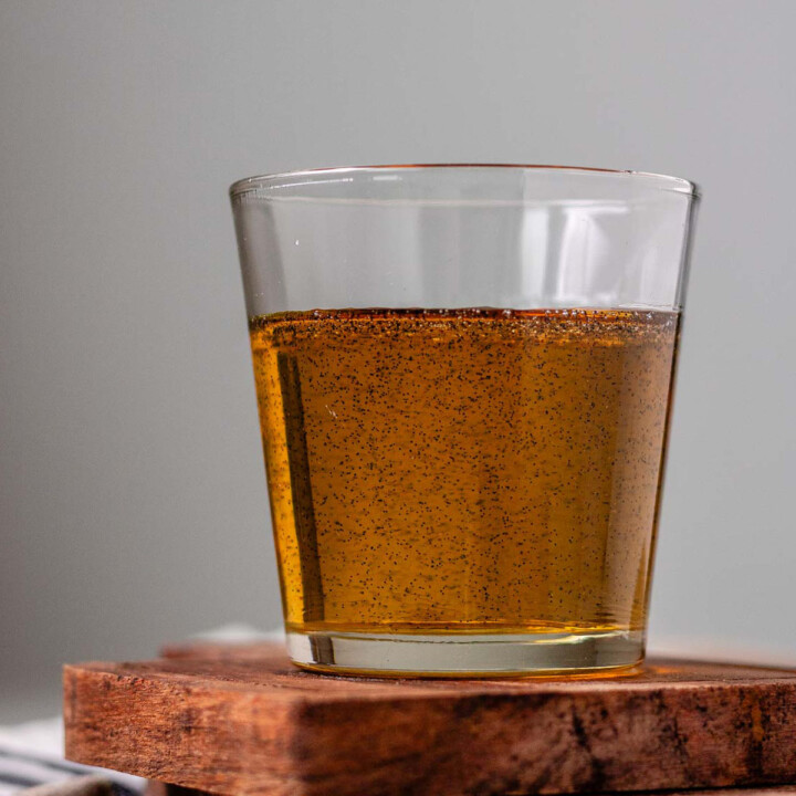 Vanilla bean syrup in a glass.